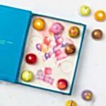 Blue bonbons box with balloons Illustration